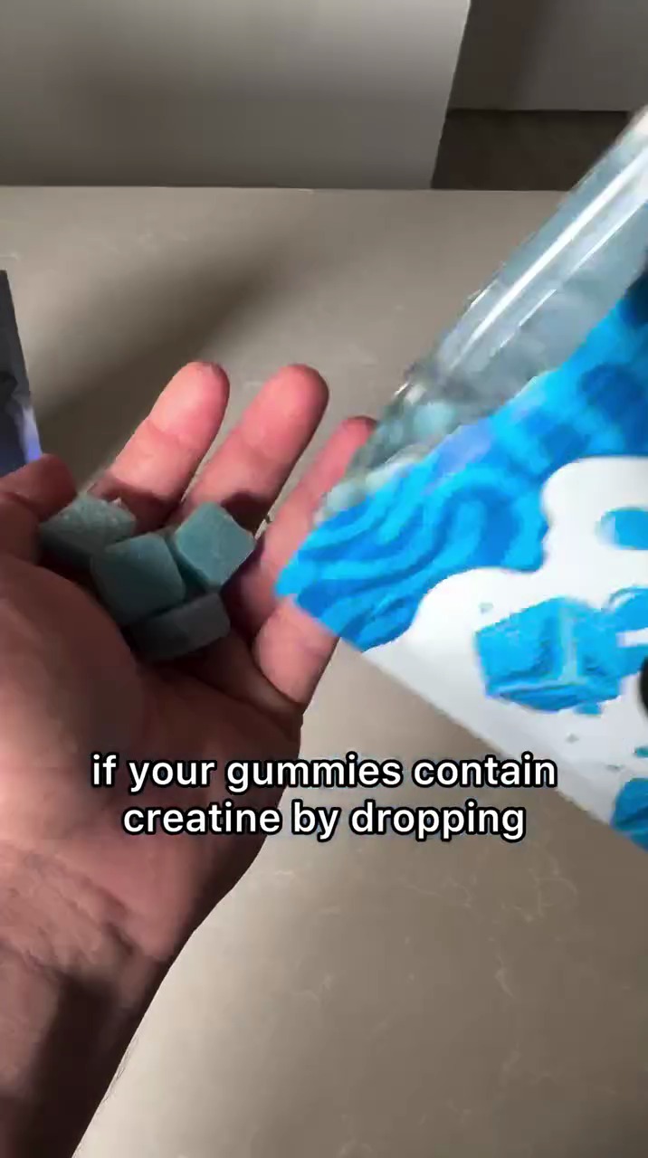 Gummies poured into a palm
